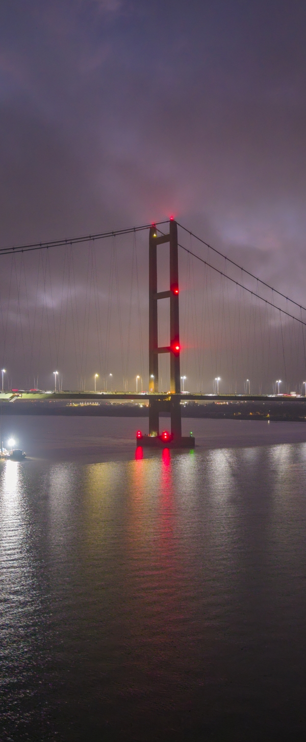 Night time drone shot over Humber Bridge