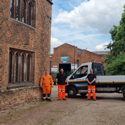 Operatives delivering donation