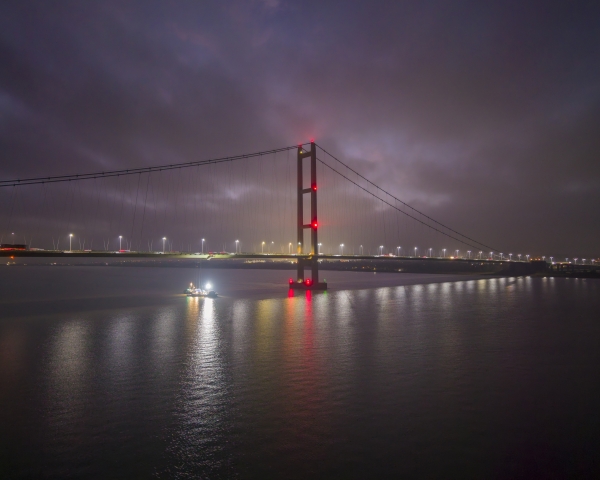 Night time drone shot over Humber Bridge