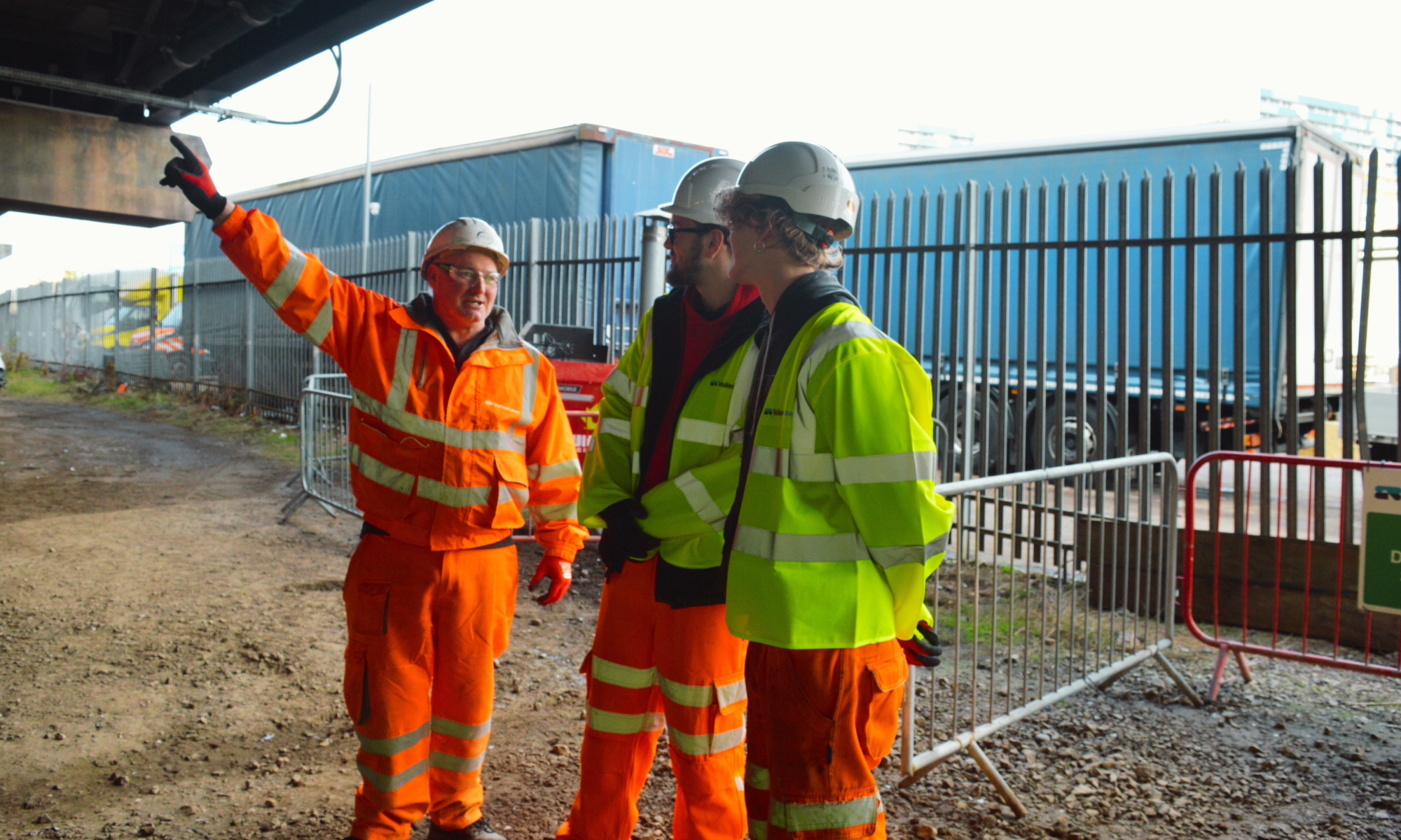 Senior operative engaging with apprentices