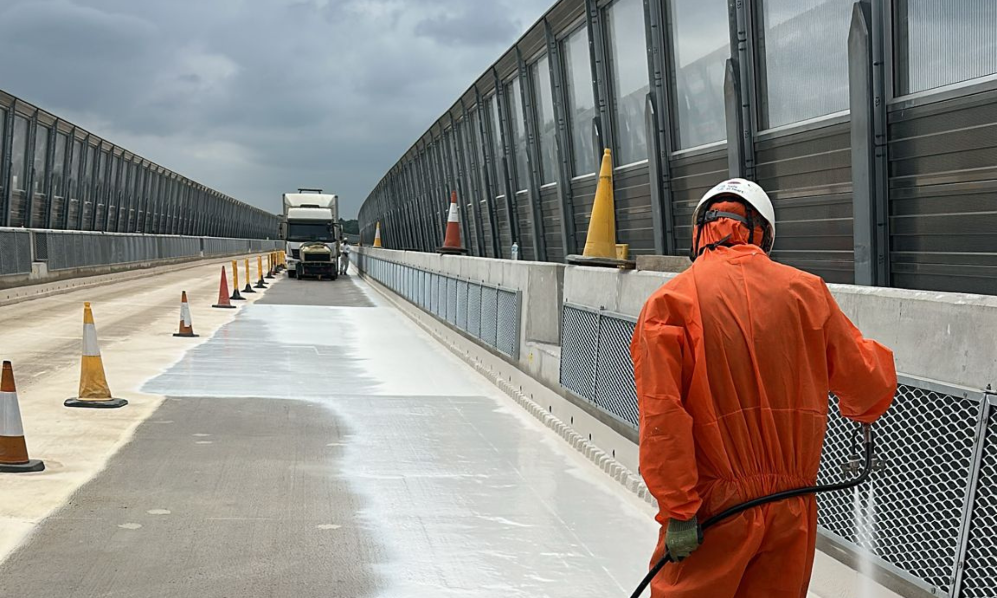 VolkerLaser waterproofing operative spraying Eliminator One-Coat