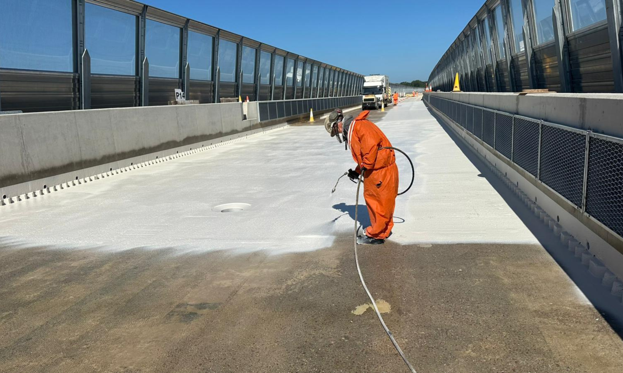 Application of Eliminator One-Coat to main areas of the viaduct deck