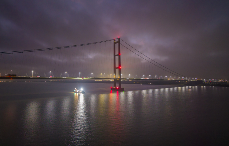 Night time drone shot over Humber Bridge